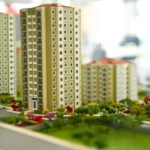 Close-up image of a modern residential building model, showcasing urban architecture.
